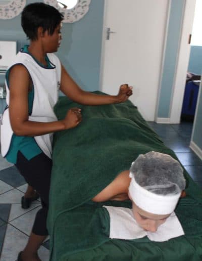 Hydro International College students in massage therapy class